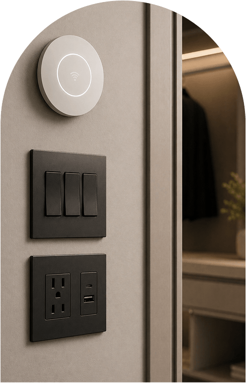 A white light switch and a black switch mounted on a wall, showcasing contrasting colors and designs.