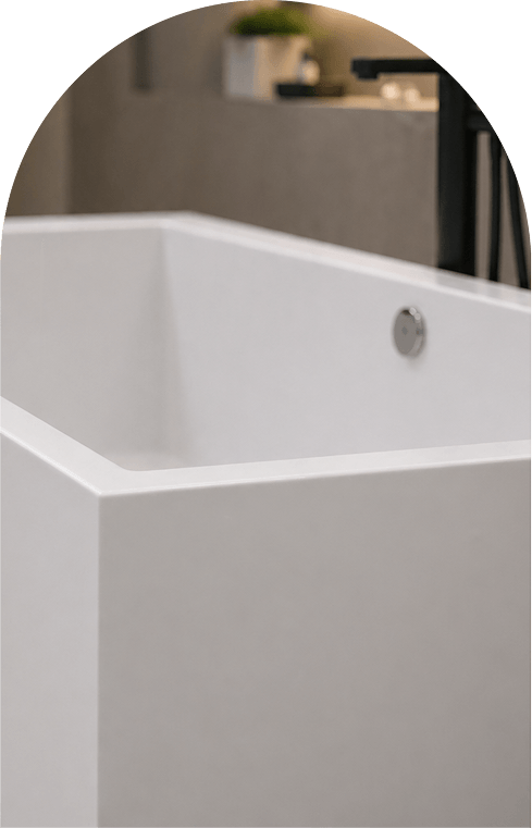 A white bathtub featuring a stylish black and white design, showcasing modern aesthetics and elegance.